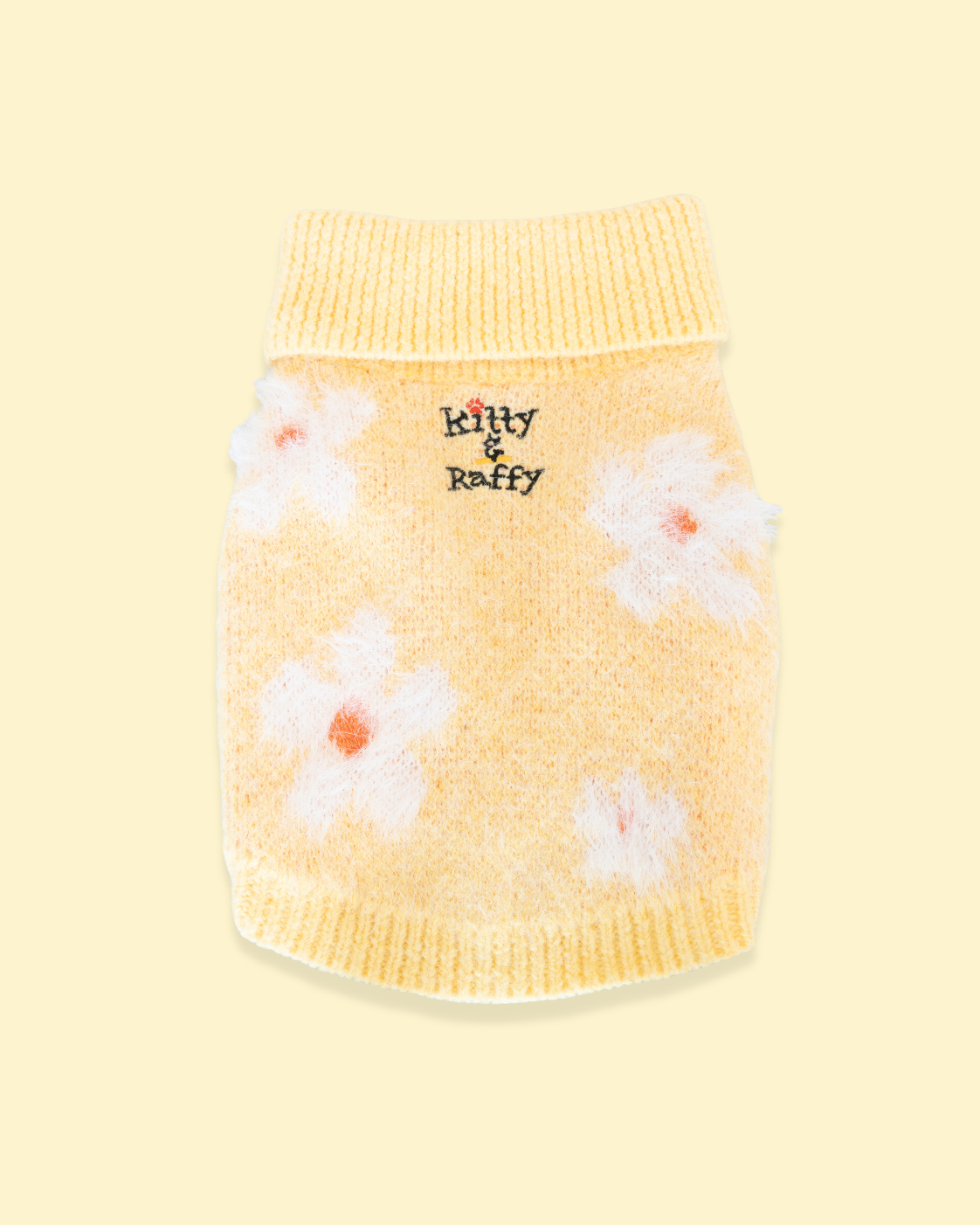A yellow knit sweater for Comfort Me Raffy with white daisy patterns