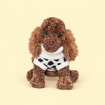 Comfort Me Raffy, comfort plush toy, wears a knitted leopard print jumper